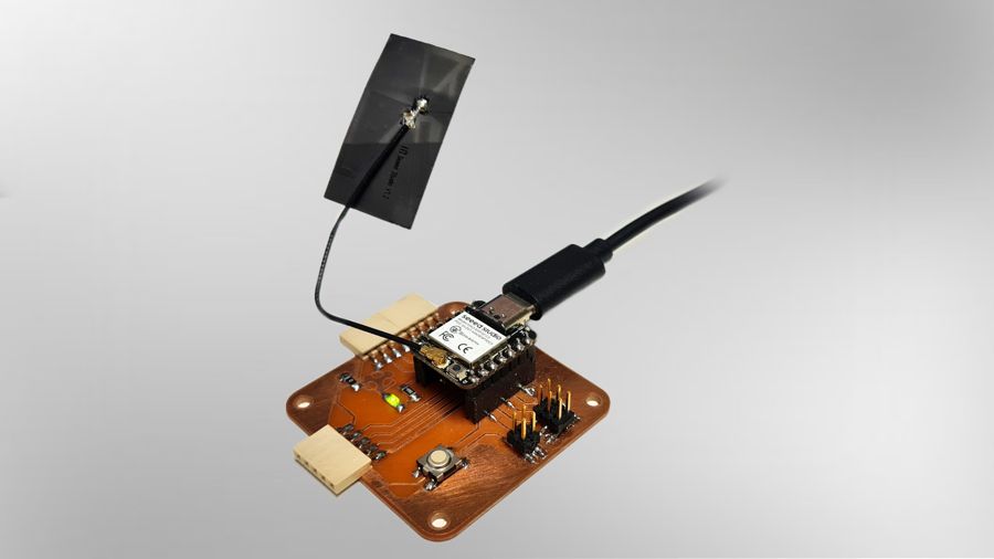 Milled copper breakout PCB with a XIAO ESP32C3 module and antenna